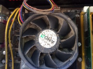 Computer with fan clogged by dust