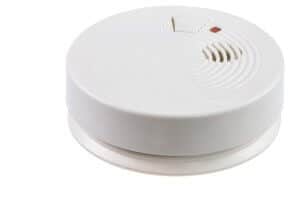Fire safety with a smoke detector (isolated on white)