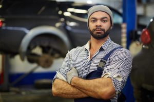 Owner of car service looking at camera