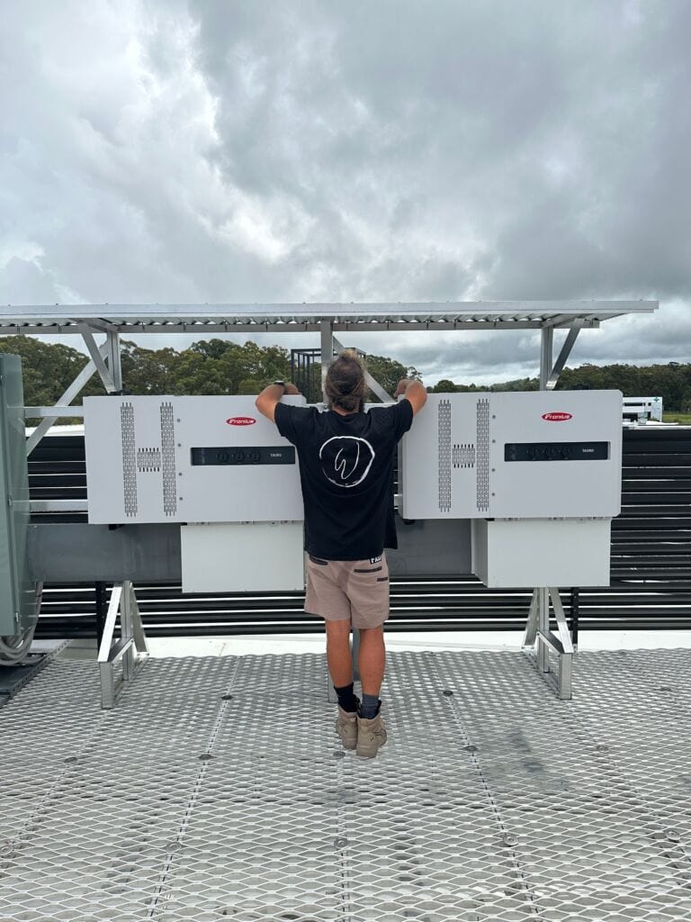 Wix energy staff installing solar power